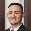 Travis  Poulos
