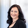 Janine  Corti
