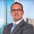 Clay A. Cossé