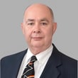Larry  Corman